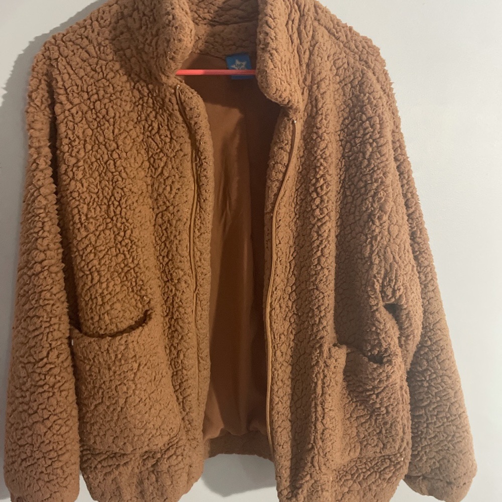 emma chamberlain “poopy” jacket